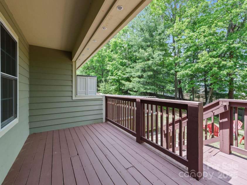 23 Aberdeen Drive, Arden, NC 28704.  MLS# CAR4258815, YatesRealty ID 19735. Covered back deck
