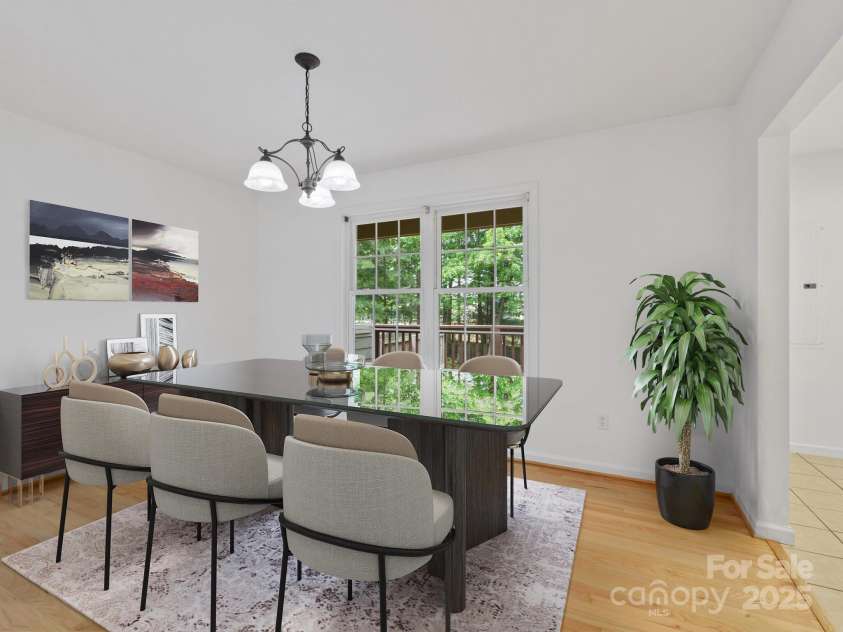 23 Aberdeen Drive, Arden, NC 28704.  MLS# CAR4258815, YatesRealty ID 19735. Dining Rm. Digitally staged.