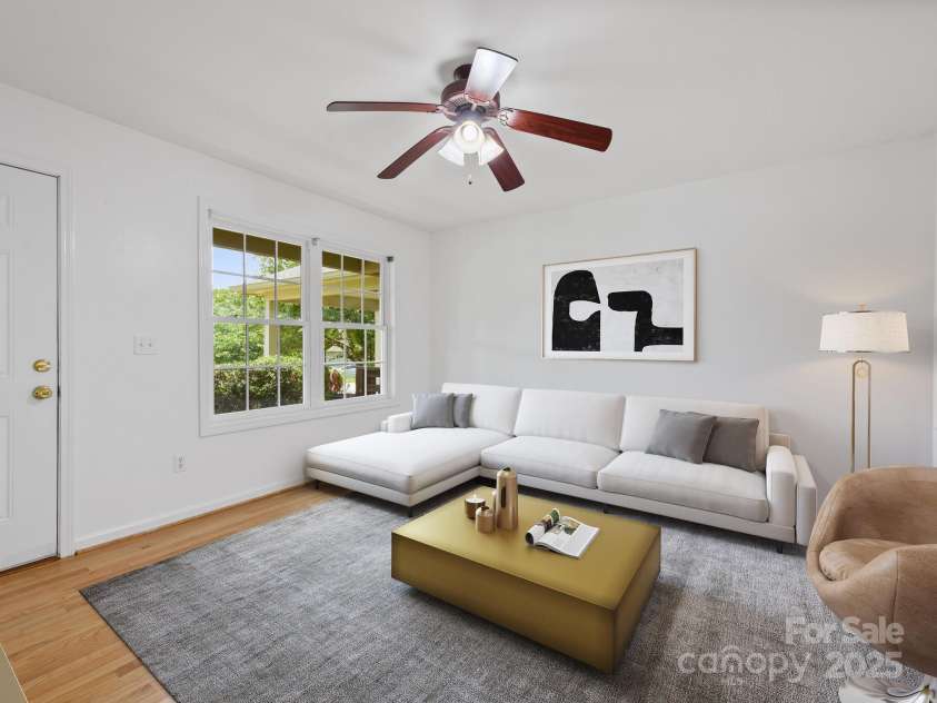 23 Aberdeen Drive, Arden, NC 28704.  MLS# CAR4258815, YatesRealty ID 19735. Family Rm. Digitally staged.