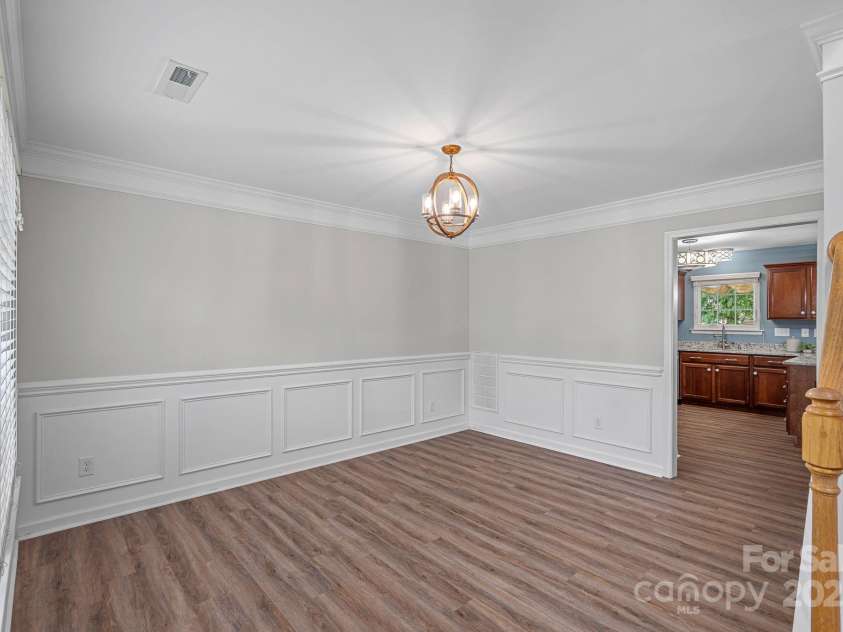 2043 Covered Bridge Court, Rock Hill, SC 29732.  MLS# CAR4285482, YatesRealty ID 19738. View of Formal dining room looking into Kitchen. new light fixture!