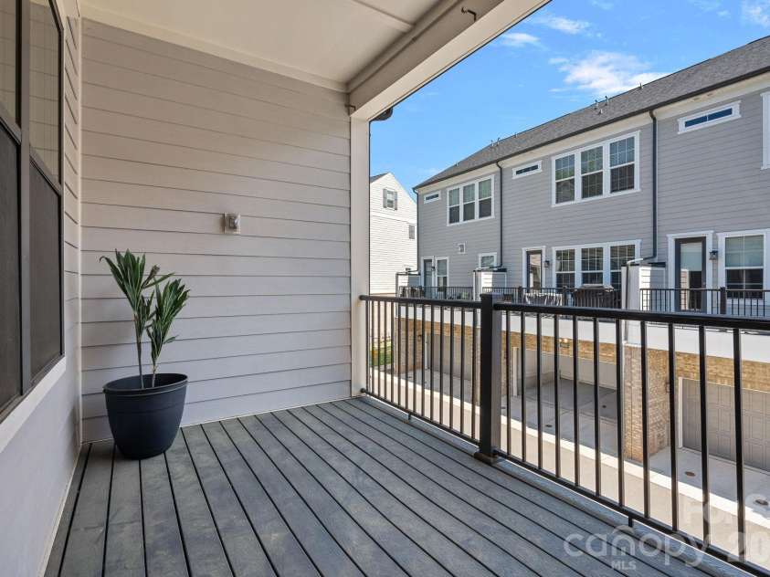 2543 Deacon Avenue, Charlotte, NC 28204.  MLS# CAR4375076, YatesRealty ID 19742. 2nd floor balcony off kitchen