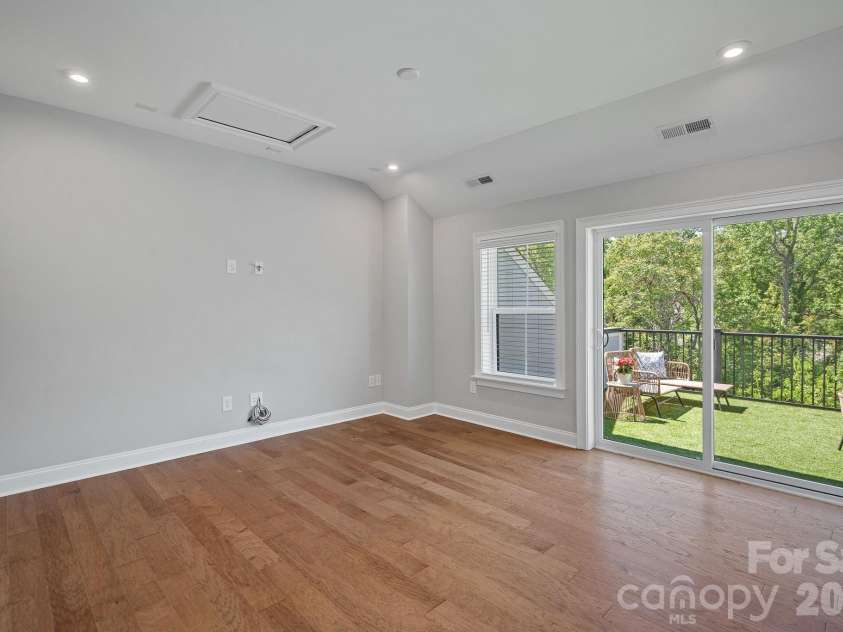 2543 Deacon Avenue, Charlotte, NC 28204.  MLS# CAR4375076, YatesRealty ID 19742. 4th floor bedroom with access to rooftop terrace