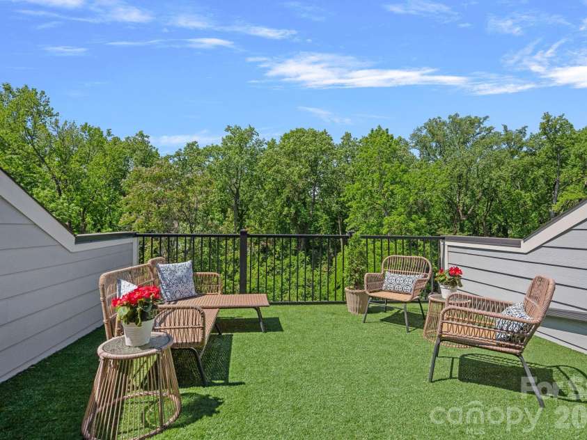 2543 Deacon Avenue, Charlotte, NC 28204.  MLS# CAR4375076, YatesRealty ID 19742. Rooftop terrace with tree-lined views