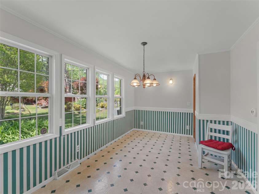 4 Forge Drive, Mills River, NC 28759.  MLS# CAR4373481, YatesRealty ID 19743. Large screened in porch.