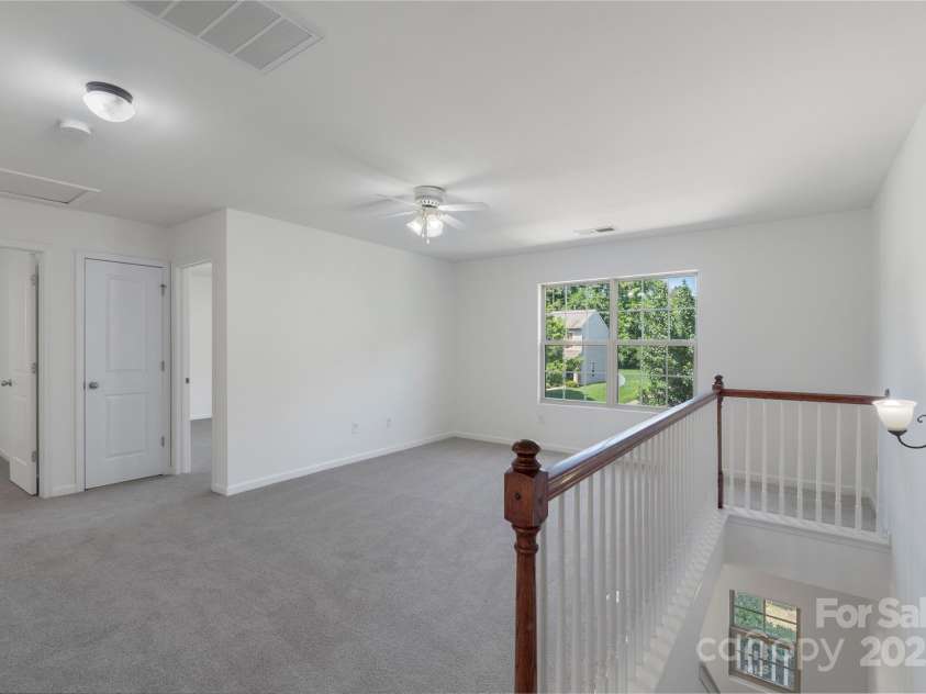 858 Rook Road, Charlotte, NC 28216.  MLS# CAR4269676, YatesRealty ID 19743. A loft is the perfect flex space