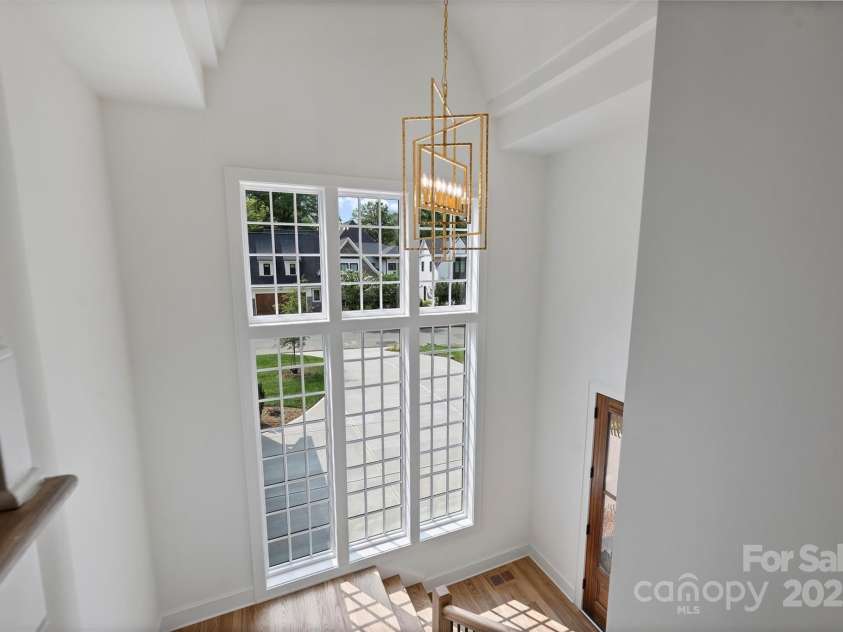2921 Windsor Avenue, Charlotte, NC 28209.  MLS# CAR4268835, YatesRealty ID 19745. Custom landing and window design to the second floor 