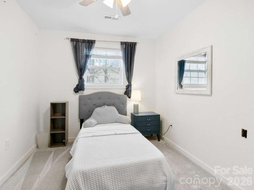 10 Bear Trail, Fairview, NC 28730.  MLS# CAR4232914, YatesRealty ID 19748. 2nd bedroom - since pictures were taken, larger window added for improved ingress/egress.