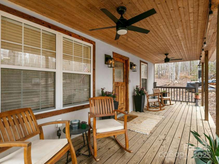 10 Bear Trail, Fairview, NC 28730.  MLS# CAR4232914, YatesRealty ID 19748. Covered front porch with ceiling fan.