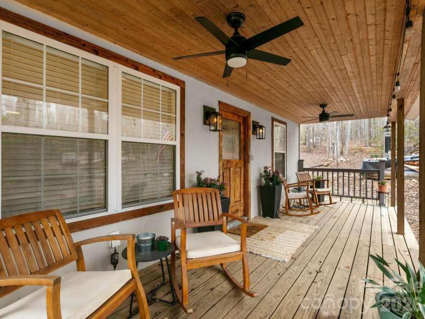 10 Bear Trail, Fairview, NC 28730.  MLS# CAR4232914, YatesRealty ID 19748. Covered front porch with ceiling fan.