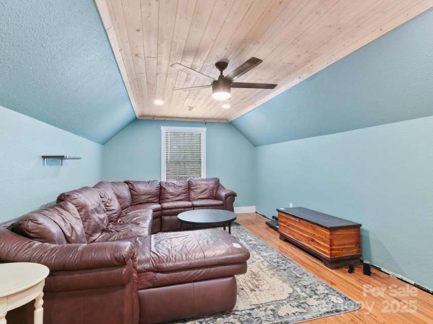10 Bear Trail, Fairview, NC 28730.  MLS# CAR4232914, YatesRealty ID 19748. Family room.