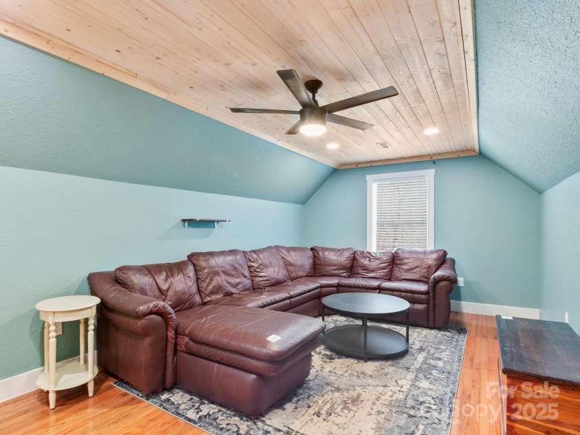 10 Bear Trail, Fairview, NC 28730.  MLS# CAR4232914, YatesRealty ID 19748. Family room.