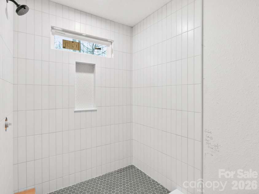 10 Bear Trail, Fairview, NC 28730.  MLS# CAR4232914, YatesRealty ID 19748. Primary bathroom - since pictures were taken, trim and niche have been finished. 