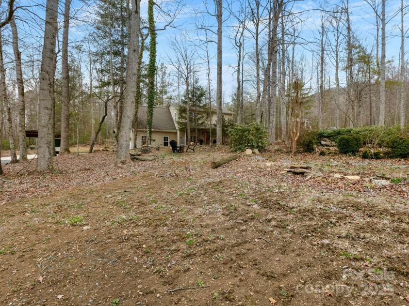 10 Bear Trail, Fairview, NC 28730.  MLS# CAR4232914, YatesRealty ID 19748. Very gentle 1.03 acre lot.