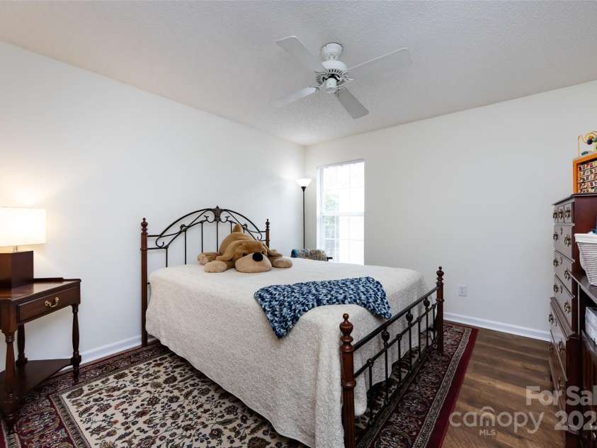 436 Delburg Street, Davidson, NC 28036.  MLS# CAR4205810, YatesRealty ID 19749. Spacious Upstairs bedroom