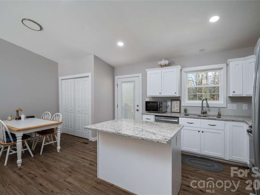660 9th Street, Newton, NC 28658.  MLS# CAR4357825, YatesRealty ID 19750. Dining Area and Kitchen