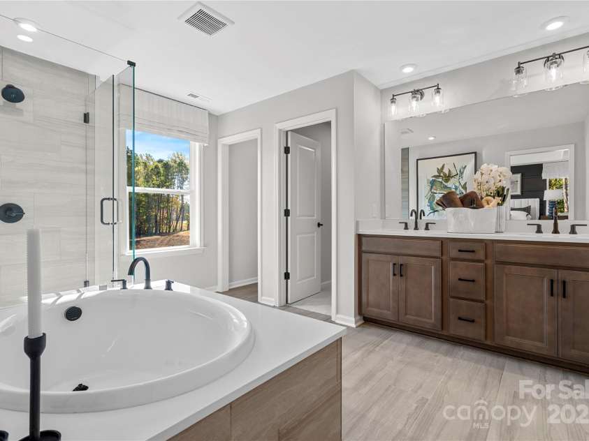 7105 Short Stirrup Lane, Mint Hill, NC 28227.  MLS# CAR4244185, YatesRealty ID 19751. The Woodwright | Alton Creek *Actual structural selections, colors, and orientation may vary. Furniture not included.