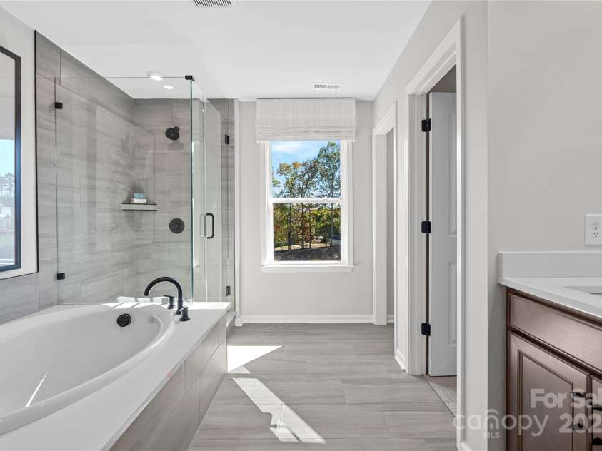 7105 Short Stirrup Lane, Mint Hill, NC 28227.  MLS# CAR4244185, YatesRealty ID 19751. The Woodwright | Alton Creek *Actual structural selections, colors, and orientation may vary. Furniture not included.