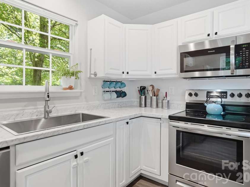 8170 Rudolph Road, Charlotte, NC 28216.  MLS# CAR4373244, YatesRealty ID 19752. Charming, isn't it?