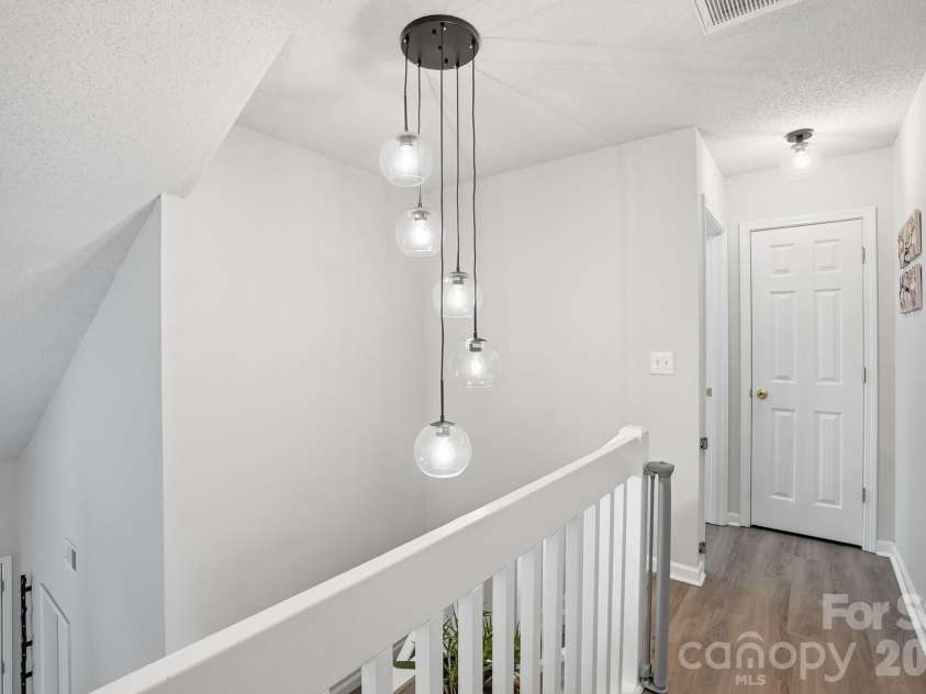 8170 Rudolph Road, Charlotte, NC 28216.  MLS# CAR4373244, YatesRealty ID 19752. Upgraded lighting throughout