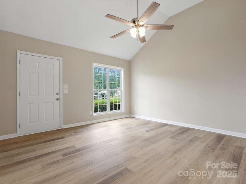 6022 Windsong Way, Wingate, NC 28174.  MLS# CAR4257511, YatesRealty ID 19758. Living Room