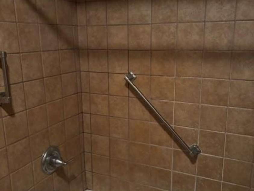 2070 Cashiers Valley Road, Brevard, NC 28712.  MLS# CAR4267083, YatesRealty ID 19763. Tile Floor and Surround in Full Bath