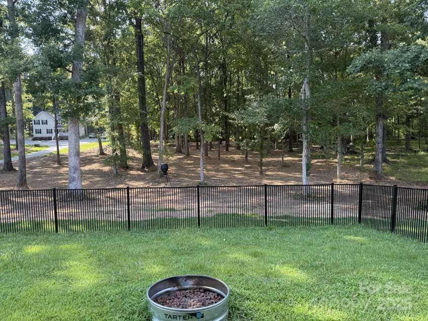 3018 Corinth Church Road, Monroe, NC 28112.  MLS# CAR4242550, YatesRealty ID 19771. Updated backyard after clearing