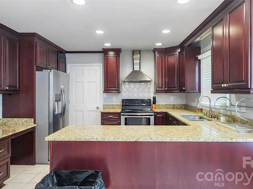 8331 Dunstaff Road, Charlotte, NC 28269.  MLS# CAR4369538, YatesRealty ID 19771. 