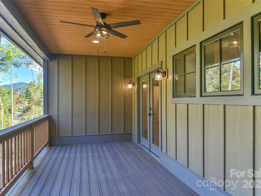 48 Crossings Circle, Fairview, NC 28730.  MLS# CAR4312919, YatesRealty ID 19773. Balcony Off Primary Suite