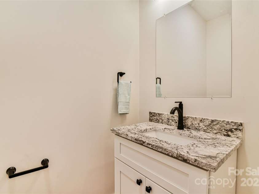 48 Crossings Circle, Fairview, NC 28730.  MLS# CAR4312919, YatesRealty ID 19773. Main Level Half Bathroom