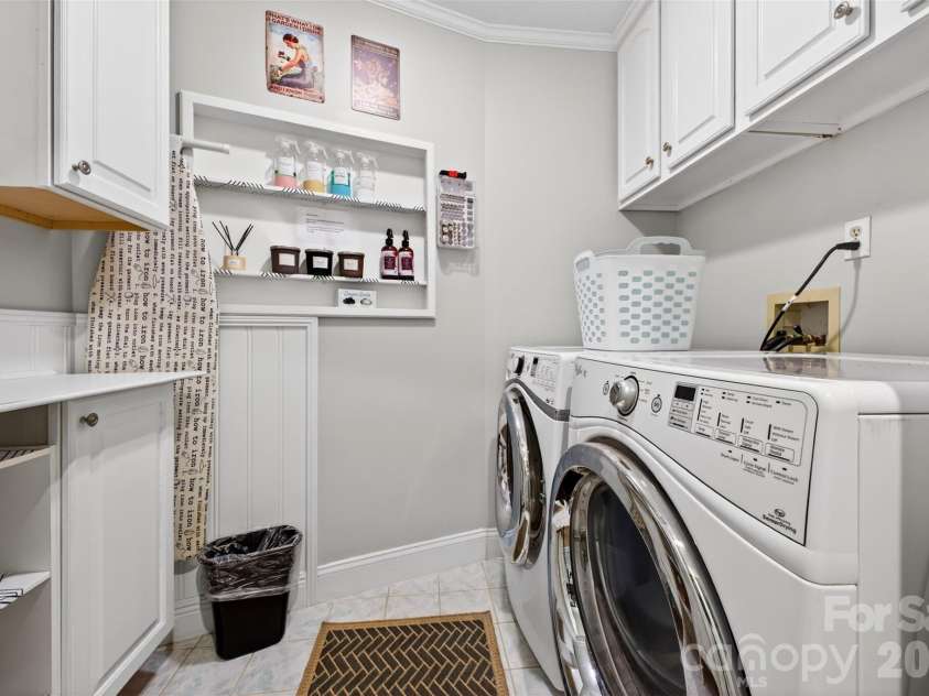 170 Weston Road, Arden, NC 28704.  MLS# CAR4379602, YatesRealty ID 19778. Main level laundry