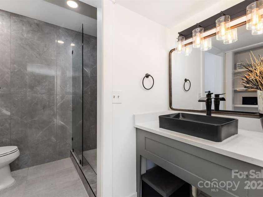 6824 Cortez Trail, Charlotte, NC 28227.  MLS# CAR4257515, YatesRealty ID 19778. Primary Bathroom (Main Floor)