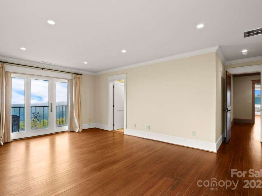 1245 Laurel Lane, Blowing Rock, NC 28605.  MLS# CAR4228582, YatesRealty ID 19780. Guest Suite #2- pvt balcony/VIEWS, bath, fireplace....