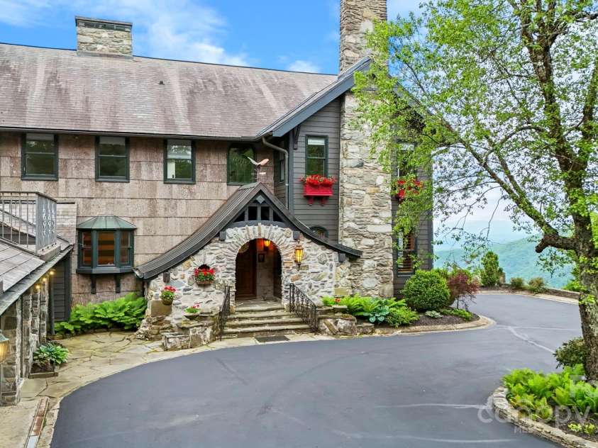 1245 Laurel Lane, Blowing Rock, NC 28605.  MLS# CAR4228582, YatesRealty ID 19780. Historic estate with preserved original stonework, bark, and more....