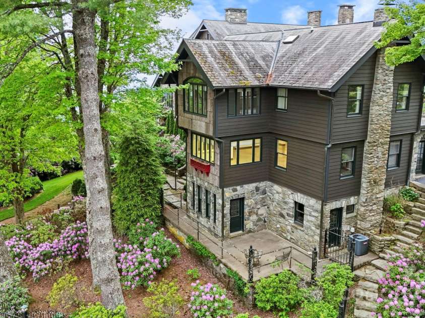 1245 Laurel Lane, Blowing Rock, NC 28605.  MLS# CAR4228582, YatesRealty ID 19780. Lower Exterior storage rooms below the home.