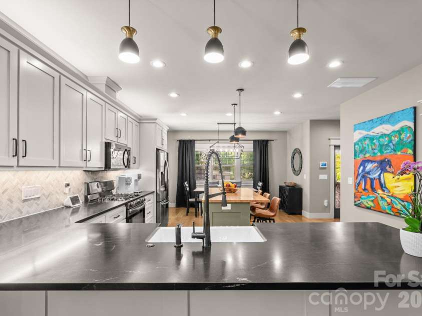 7 Acona Lane, Asheville, NC 28803.  MLS# CAR4377126, YatesRealty ID 19788. Kitchen and Dining Area