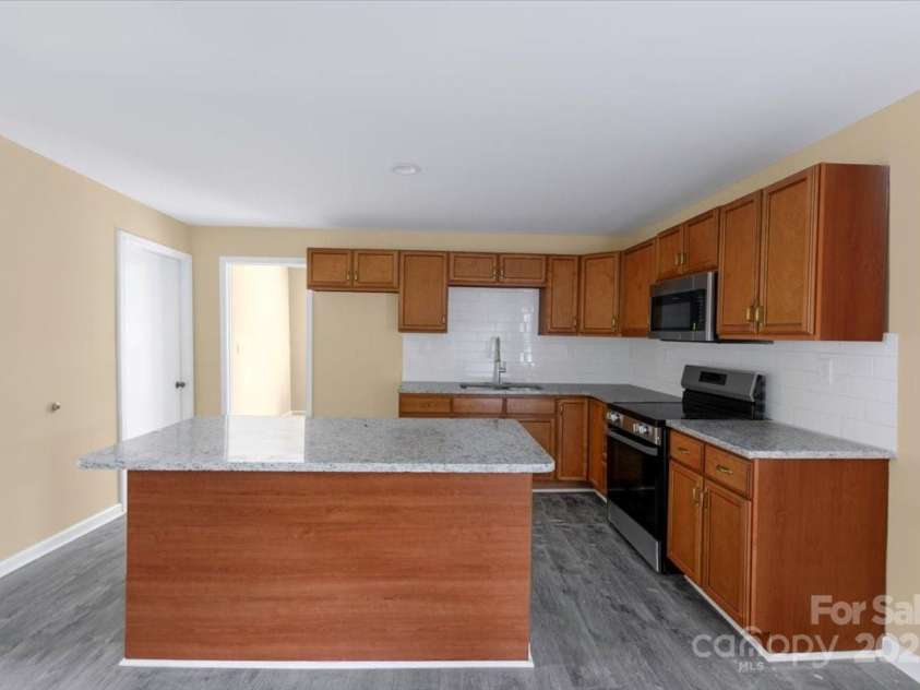 3209 Lowell Road, Lowell, NC 28054.  MLS# CAR4263316, YatesRealty ID 19789. 