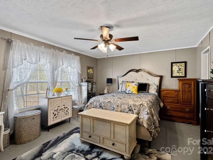 5826 Boxer Drive, Iron Station, NC 28080.  MLS# CAR4214978, YatesRealty ID 1979. Large Primary Bedroom