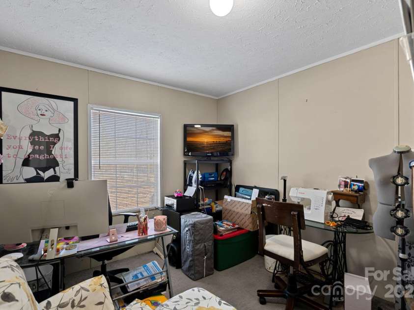 5826 Boxer Drive, Iron Station, NC 28080.  MLS# CAR4214978, YatesRealty ID 1979. Office or 3rd Bedroom or Playroom