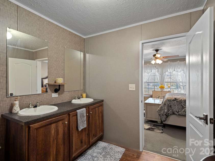 5826 Boxer Drive, Iron Station, NC 28080.  MLS# CAR4214978, YatesRealty ID 1979. Primary Bath