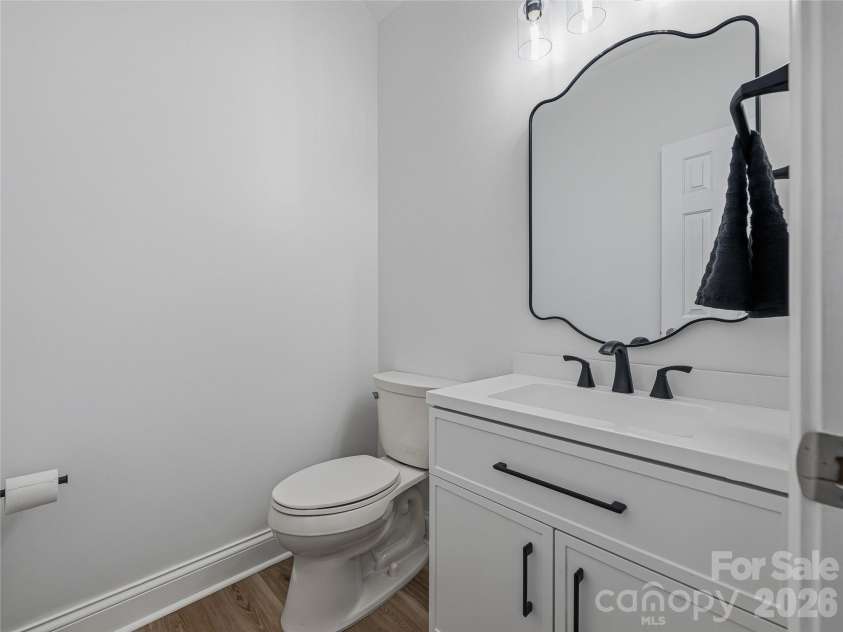 33 Florian Lane, Fletcher, NC 28732.  MLS# CAR4374744, YatesRealty ID 19791. Main floor powder room