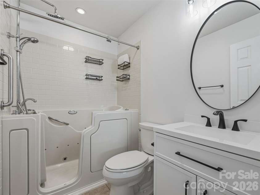 33 Florian Lane, Fletcher, NC 28732.  MLS# CAR4374744, YatesRealty ID 19791. Upper level bathroom