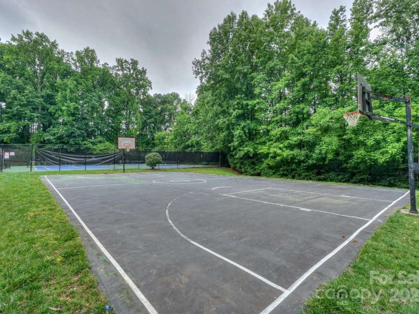 14831 Charterhouse Lane, Huntersville, NC 28078.  MLS# CAR4264707, YatesRealty ID 19794. Basketball/Sport court and tennis court