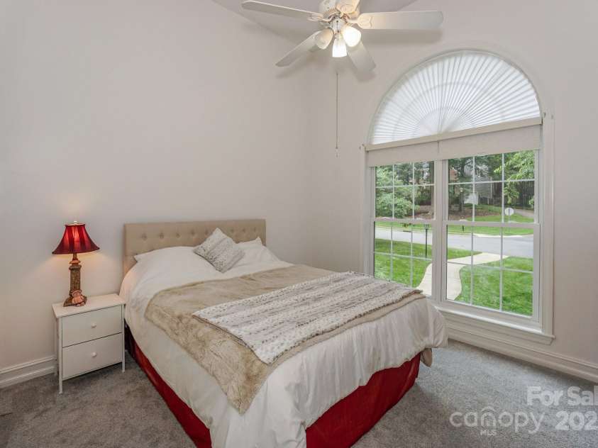 14831 Charterhouse Lane, Huntersville, NC 28078.  MLS# CAR4264707, YatesRealty ID 19794. Bedroom #2 with vaulted ceiling