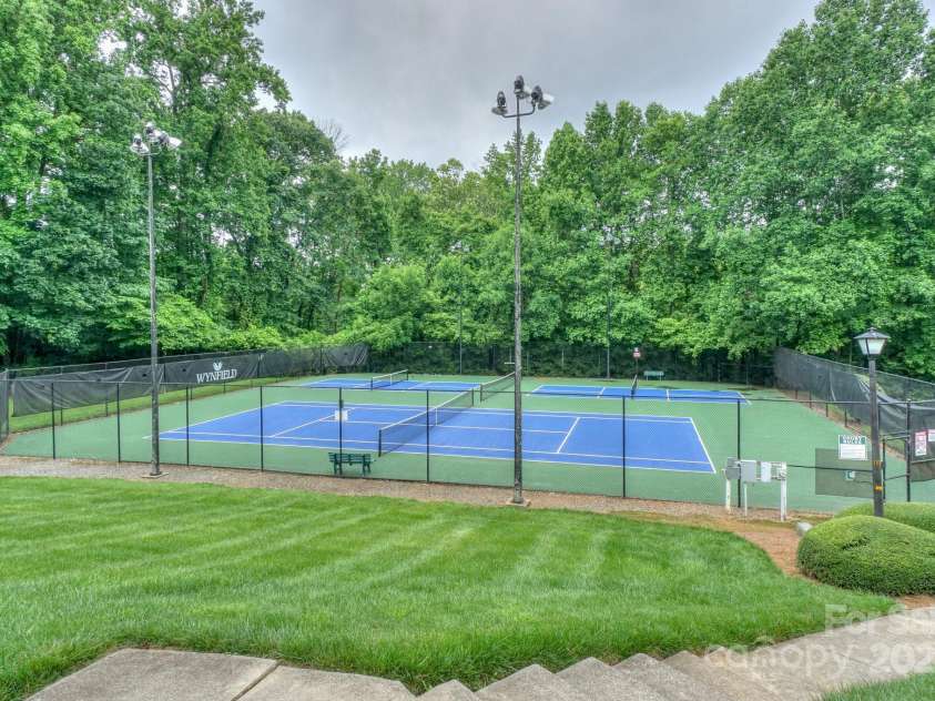 14831 Charterhouse Lane, Huntersville, NC 28078.  MLS# CAR4264707, YatesRealty ID 19794. Enjoying playing tennis or enjoy the other courts for pickleball