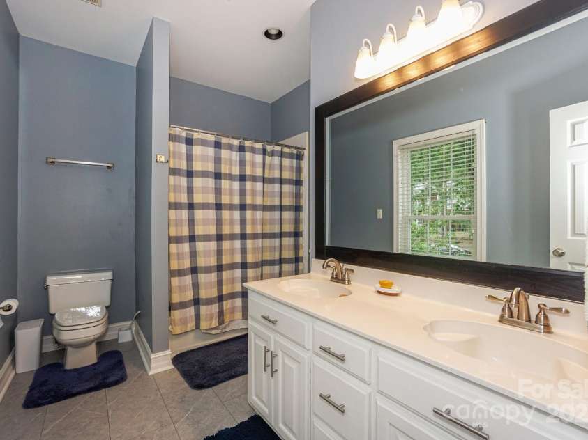 14831 Charterhouse Lane, Huntersville, NC 28078.  MLS# CAR4264707, YatesRealty ID 19794. Full Bath between bedroom 2 and 3