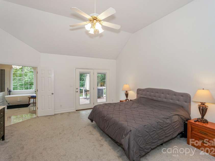 14831 Charterhouse Lane, Huntersville, NC 28078.  MLS# CAR4264707, YatesRealty ID 19794. Primary Suite with Ensuite Bath and access to back deck
