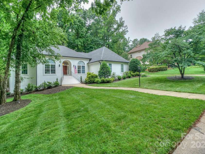 14831 Charterhouse Lane, Huntersville, NC 28078.  MLS# CAR4264707, YatesRealty ID 19794. Stunning large lot that backs up to a wooded common area for privacy