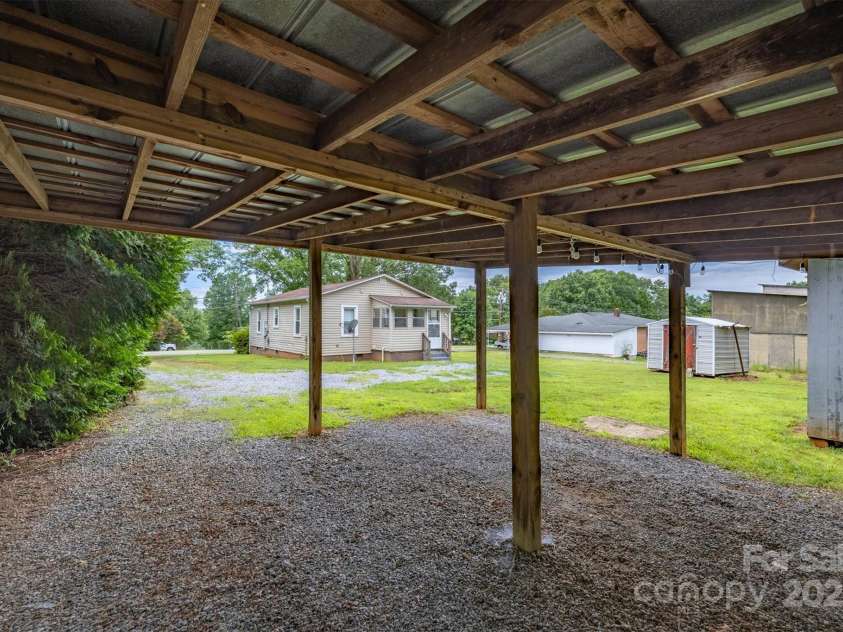 843 Summers Road, Valdese, NC 28690.  MLS# CAR4266184, YatesRealty ID 19796. View from carport