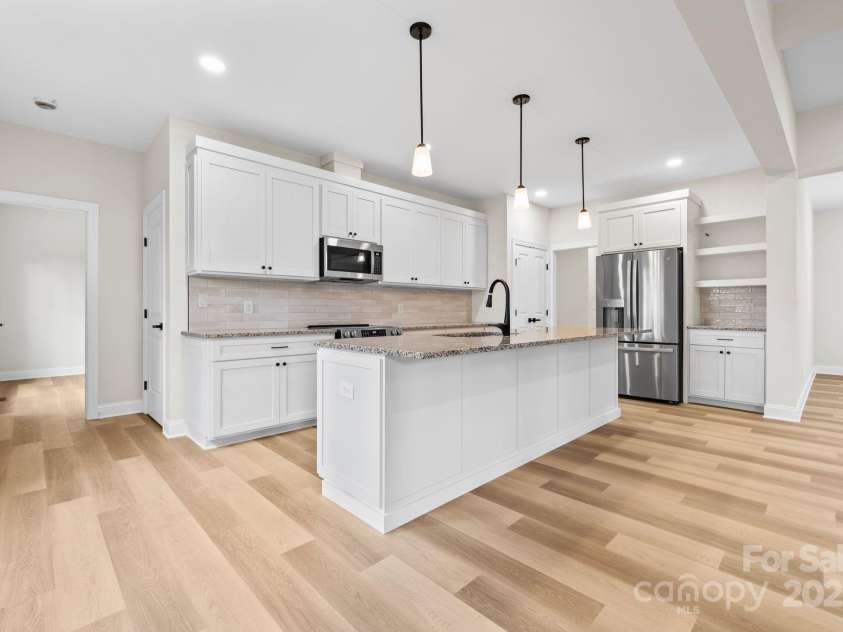5025 Harbor View Drive, Granite Falls, NC 28630.  MLS# CAR4263562, YatesRealty ID 19797. Meal prep, midnight snacks, or morning coffee—this kitchen’s got you covered.