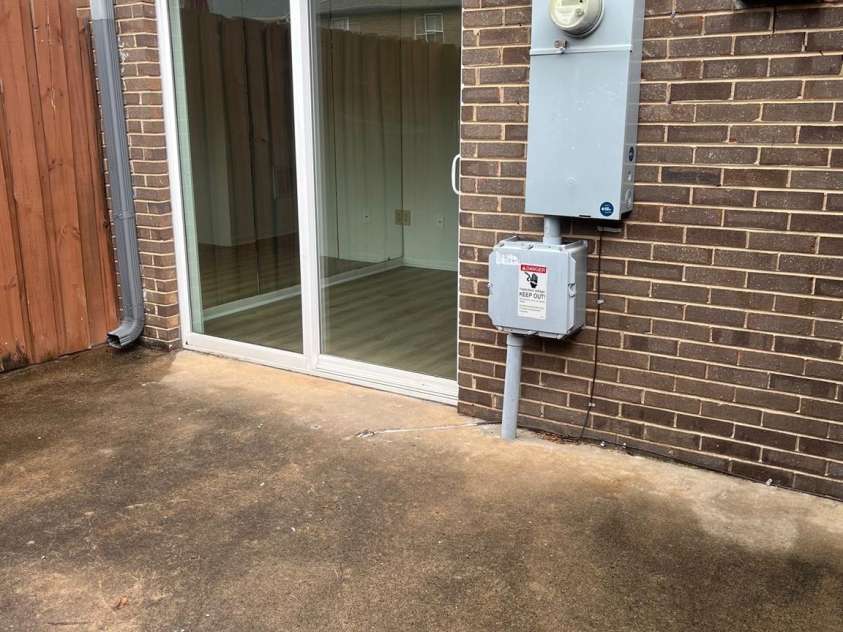 4520 Central Avenue, Charlotte, NC 28205.  MLS# CAR4231851, YatesRealty ID 19799. Back Private Patio with outdoor storage shed